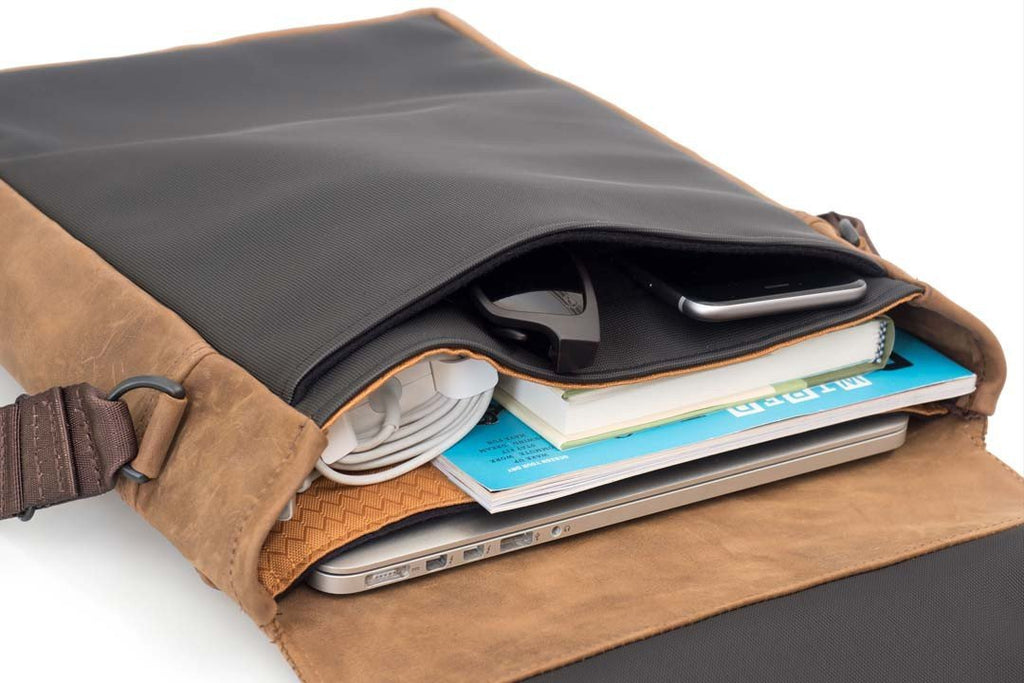 MacBook fit in the built-in padded compartment