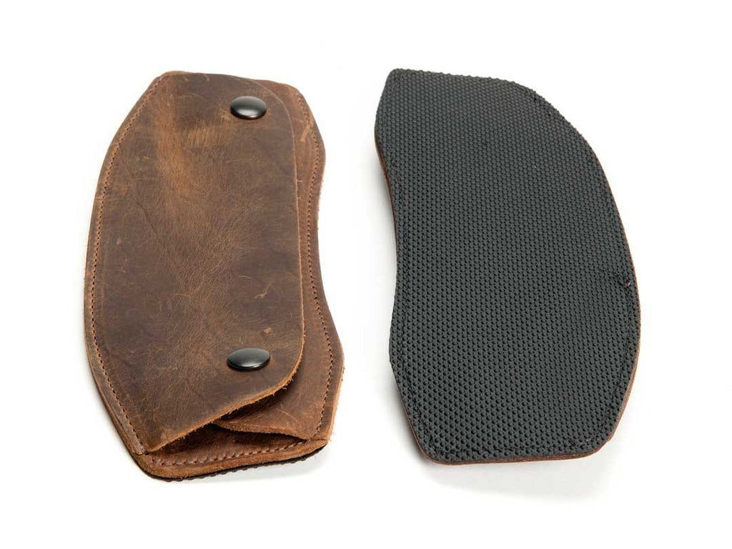 Matching leather shoulder pad included. Grippy underside.